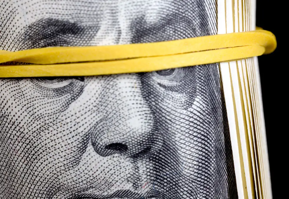 Dollars_Eyes Obstructed With Rubber Band Dollars_Eyes Obstructed With Rubber Band