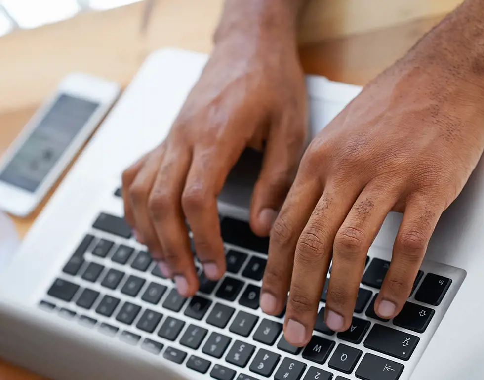 Man Typing On Laptop Man Typing On Laptop