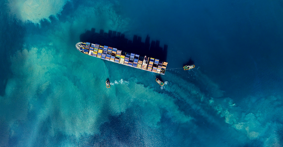 Cargo Ship Tugs From Above